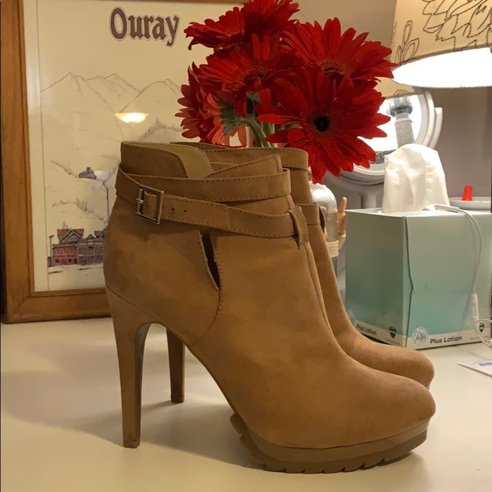 Tan high heeled booties